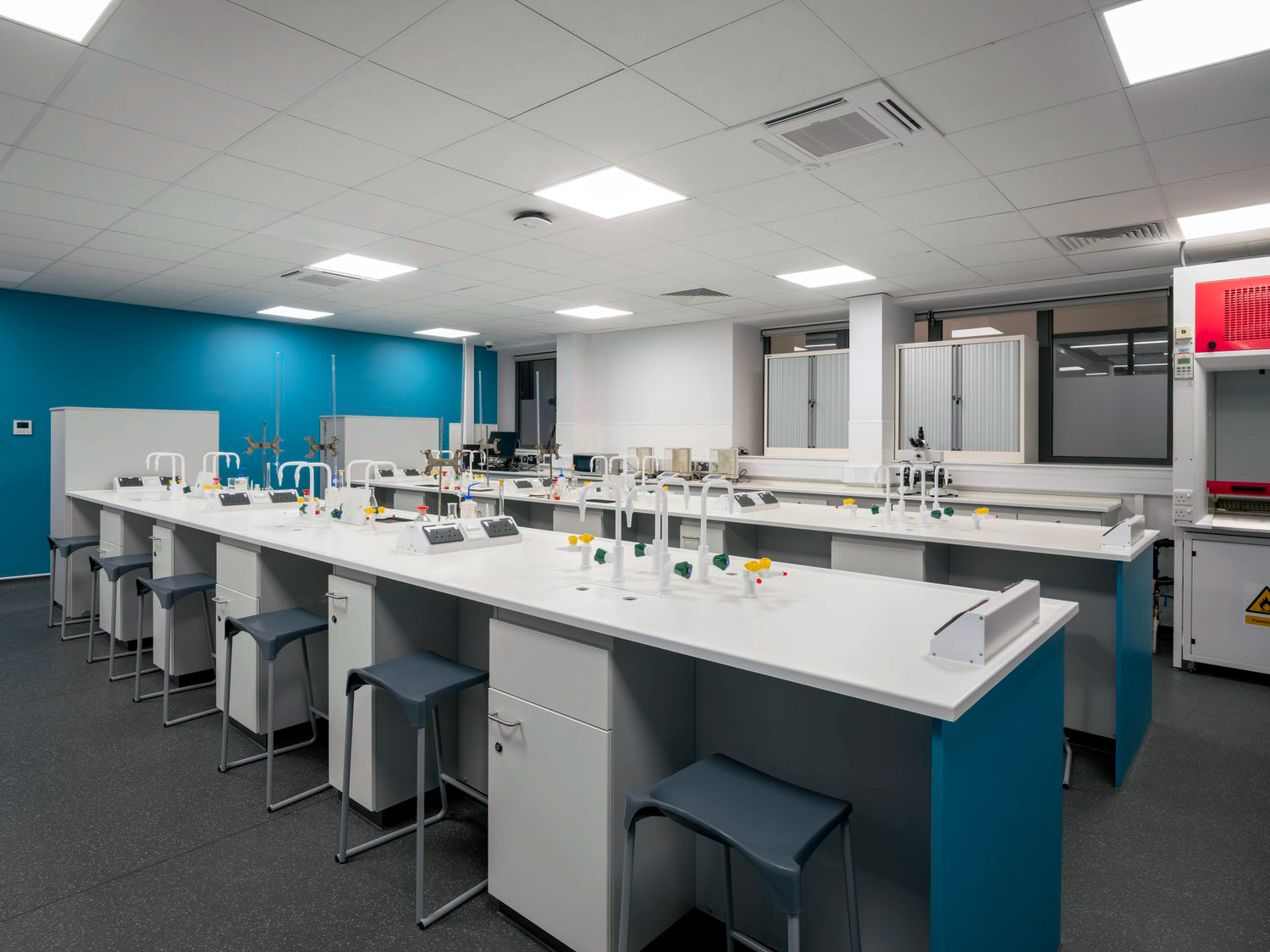 Expansive open laboratory space with fixed laboratory furniture installed in London.