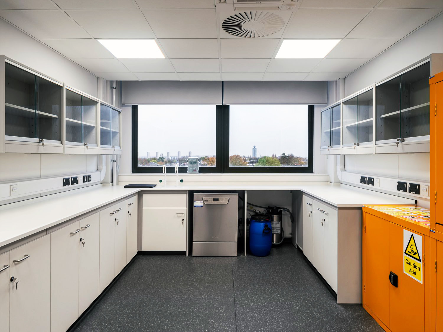Fixed laboratory benching and cabinets installed at the University of West London. Glass wall cabinets, chemical storage cabinets, lockable cabinets.